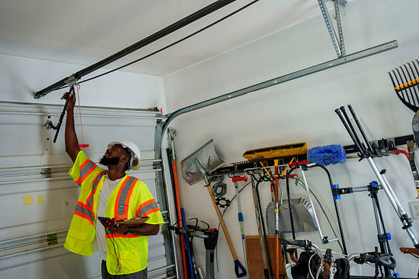 Professional Garage Door Panel Replacement technician working in Orleans, VT
